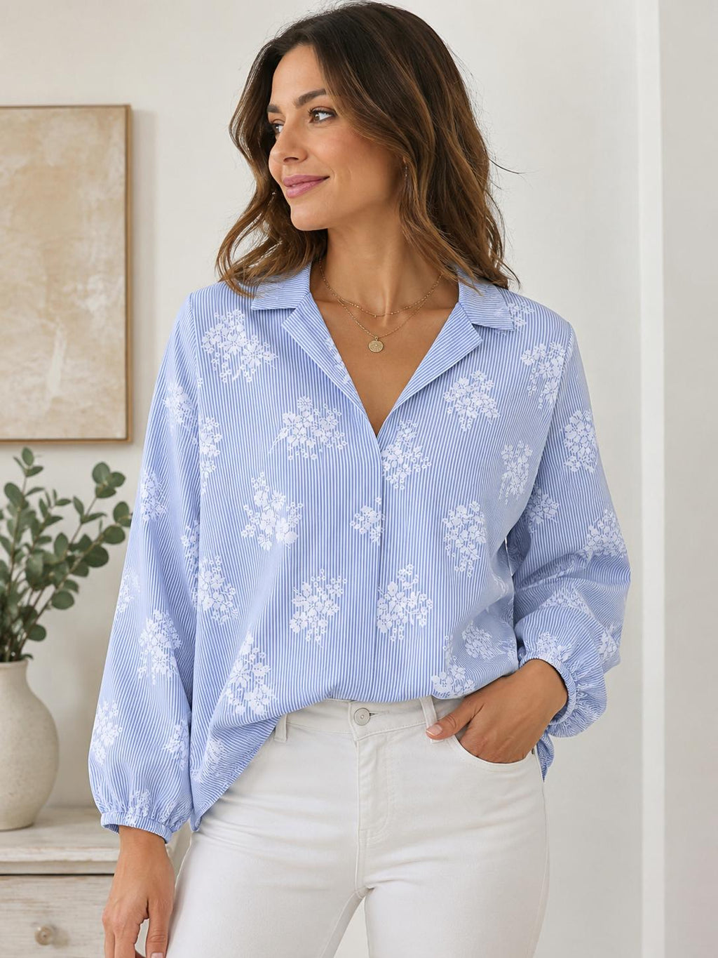Camicetta azzurra righe fiori