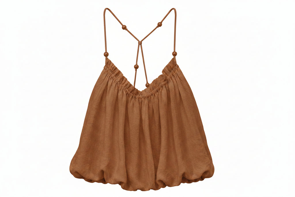 Top con spalline incrociate e perle