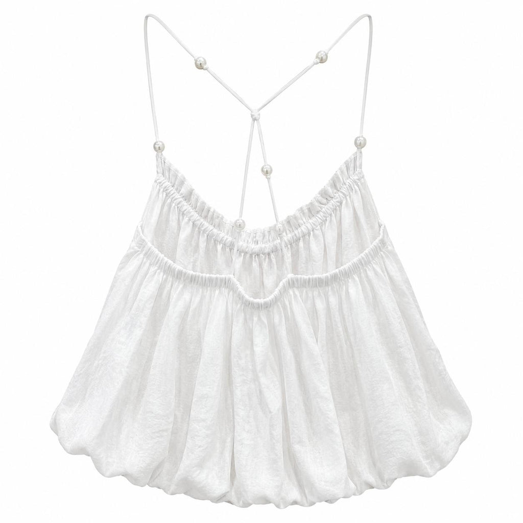 Top con spalline incrociate e perle