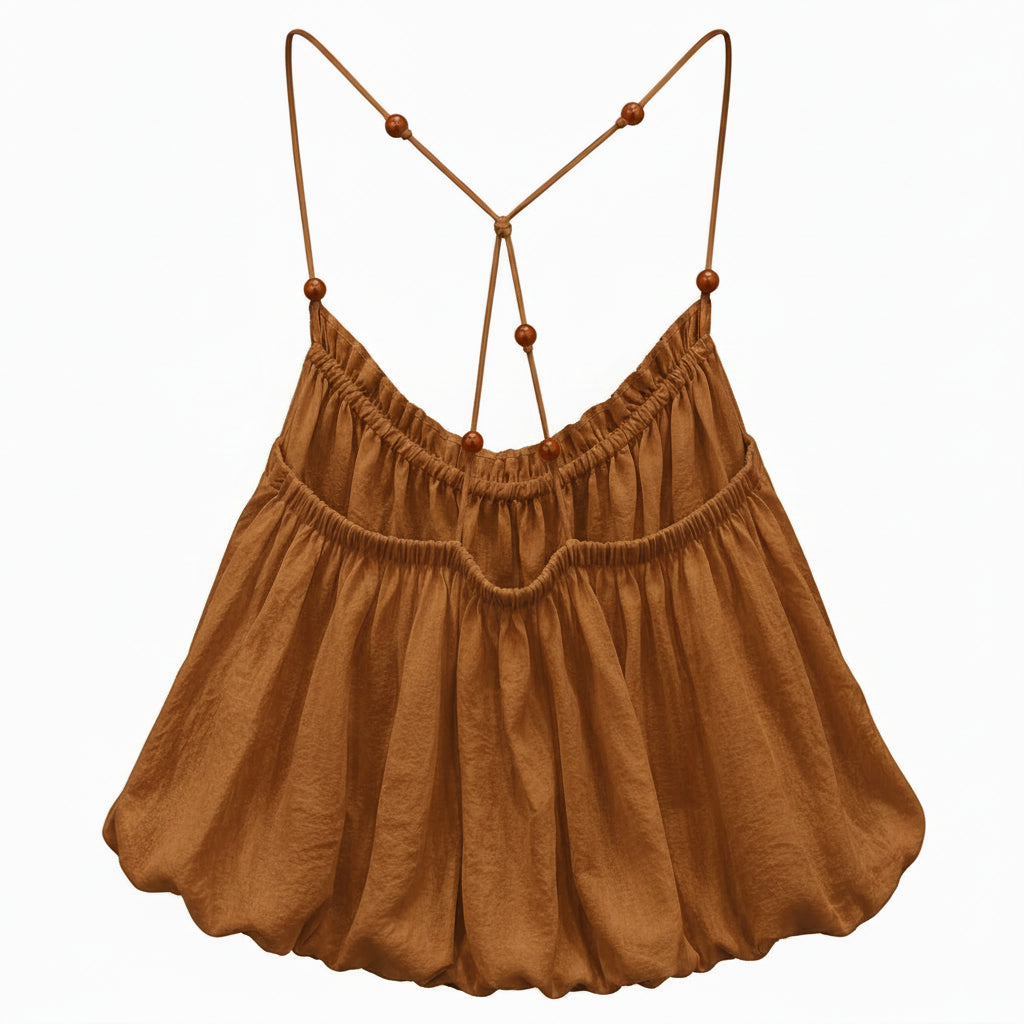 Top con spalline incrociate e perle